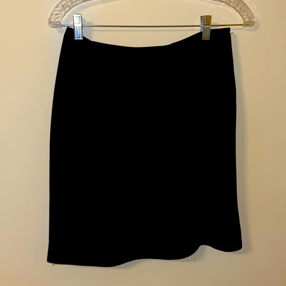 Black skirt with a zipper and slit on the back